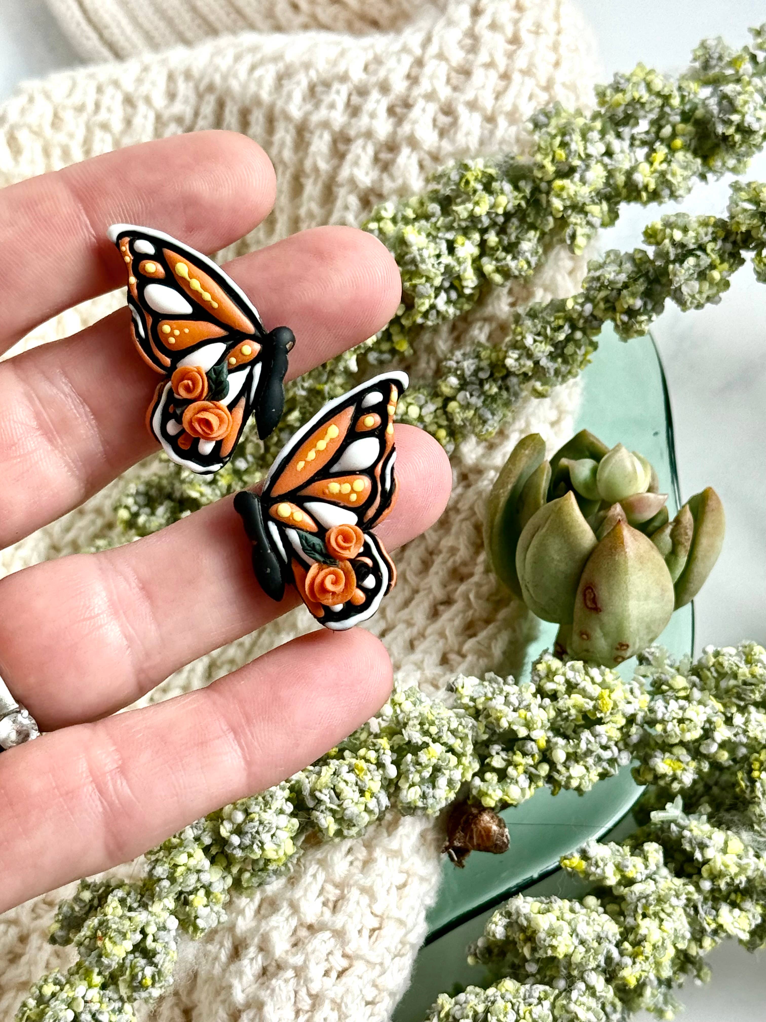 Monarch Majesty: Orange Floral Butterfly Earrings